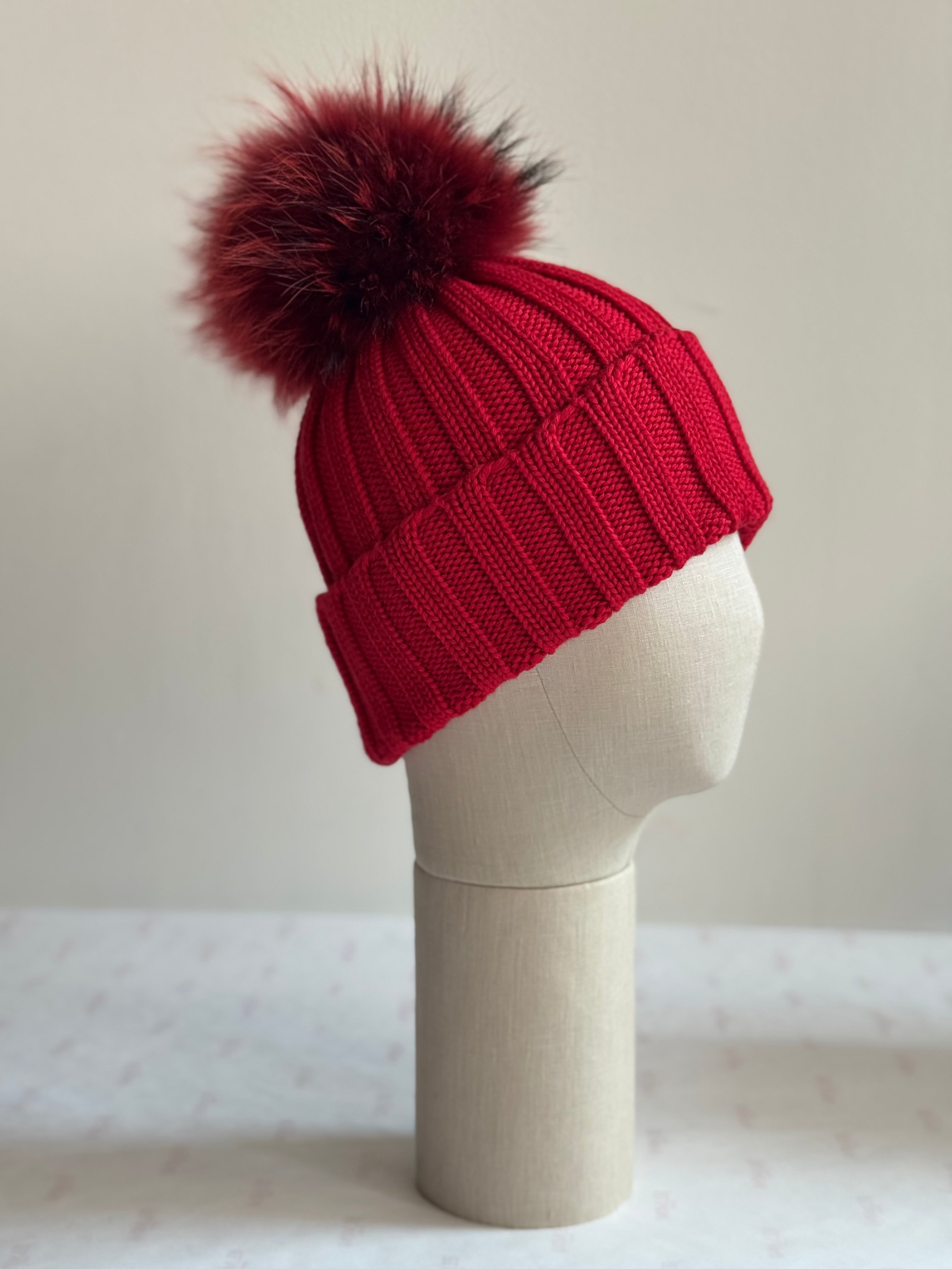 Cappello rosso con pompon